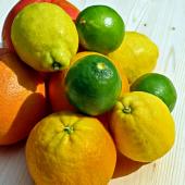 A stack of different citrus fruits