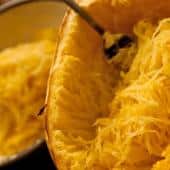 Spooning out the spaghetti from a spaghetti squash - with a fork!